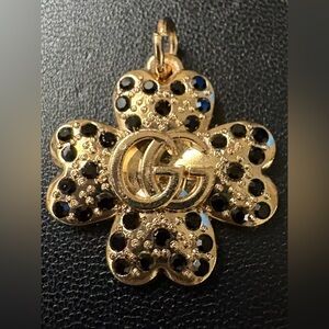 Beautiful Gucci Gold and Black Clover Zipper Pull!